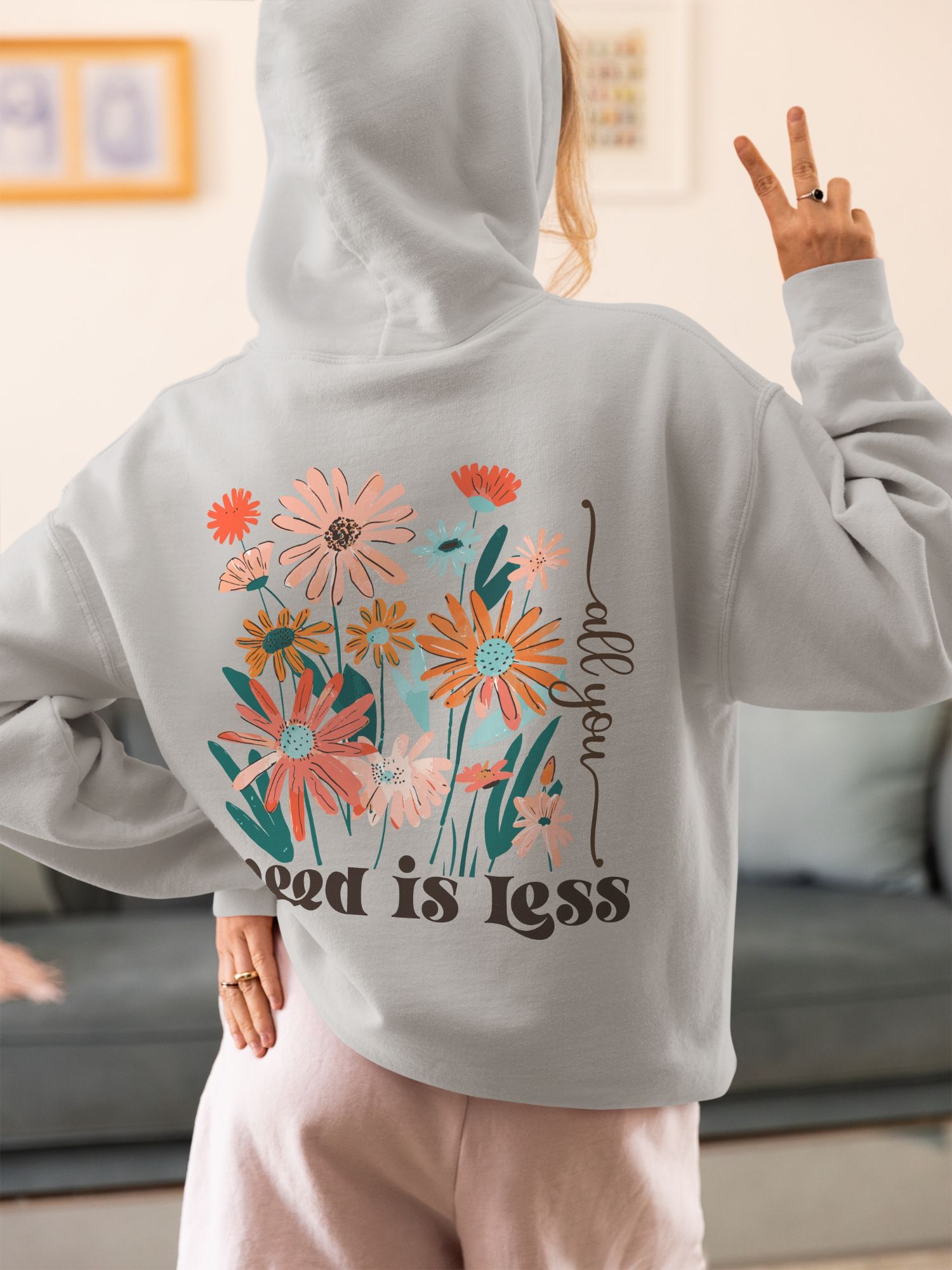 All You Need Is Less Hoodie Retro Floral Graphic Pullover Minimal Boho Style — front view